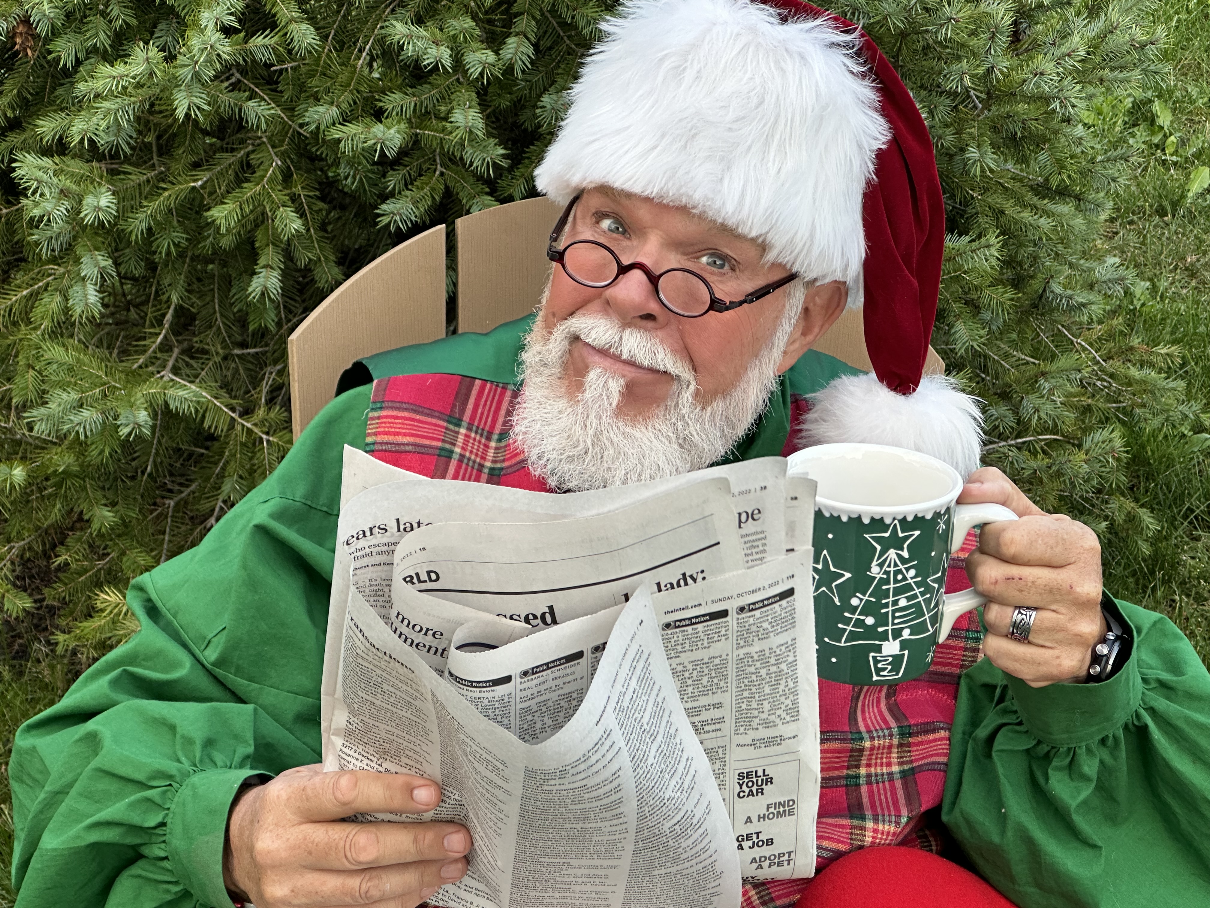 CJ Kringle posing with a festive mug
