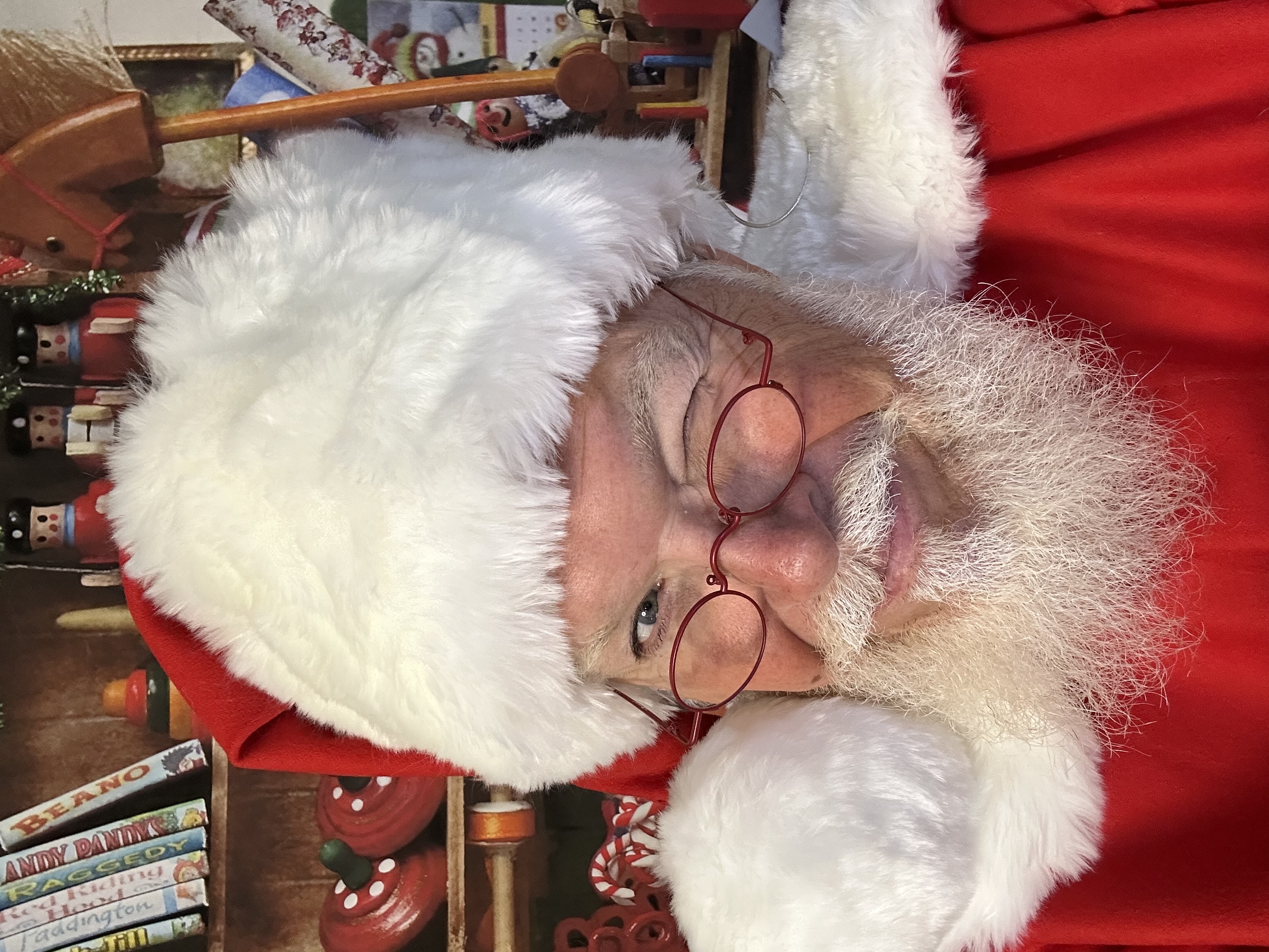 CJ Kringle winking in his suit