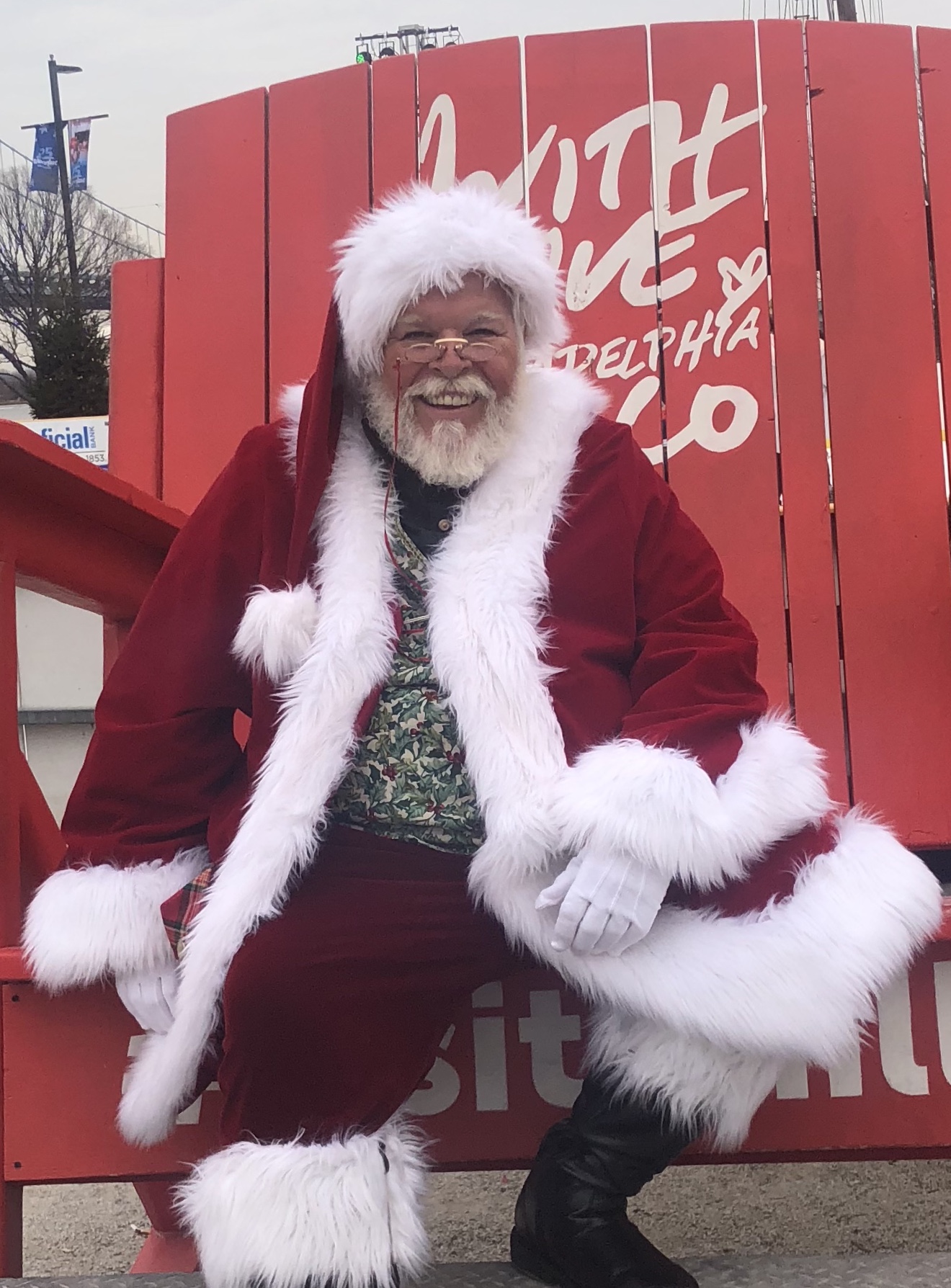 CJ Kringle with a family during the holidays